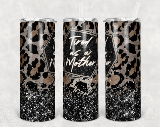 20oz skinny tumbler featuring black glitter leopard print and the phrase Tired as a Mother.