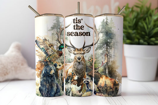 20oz skinny tumbler featuring deer, elk, bear, duck, hunting dogs, and "Tis' the Season" woodland artwork.