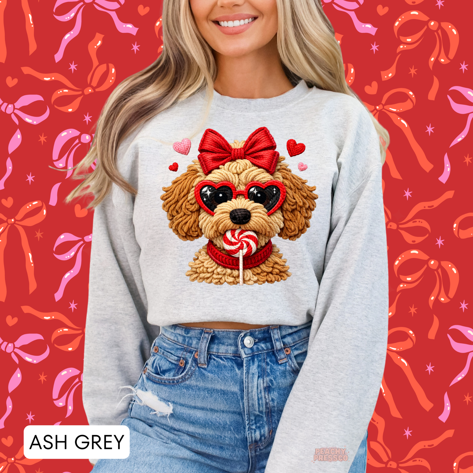Ash grey sweatshirt featuring a Valentine's Day puppy graphic with heart sunglasses, a red bow, and a peppermint lollipop for dog lovers.