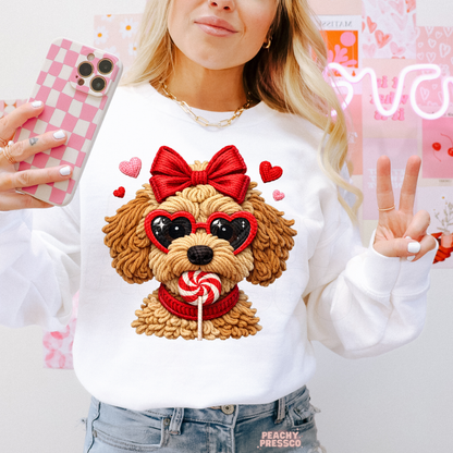 White Valentine's Day sweatshirt showcasing a cute puppy with heart-shaped sunglasses, a red bow, and festive heart accents.