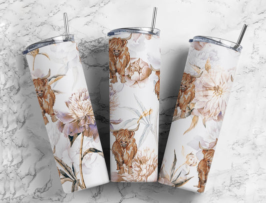 Watercolor floral Highland cow 20oz skinny tumbler featuring adorable Highland cattle surrounded by soft neutral flowers on a white background with a stainless steel straw and clear lid.