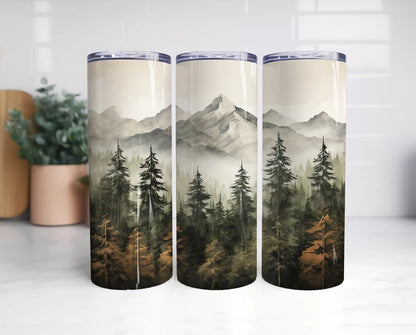 20oz tumbler with watercolor mountain landscape with evergreen forest and misty wilderness design.
