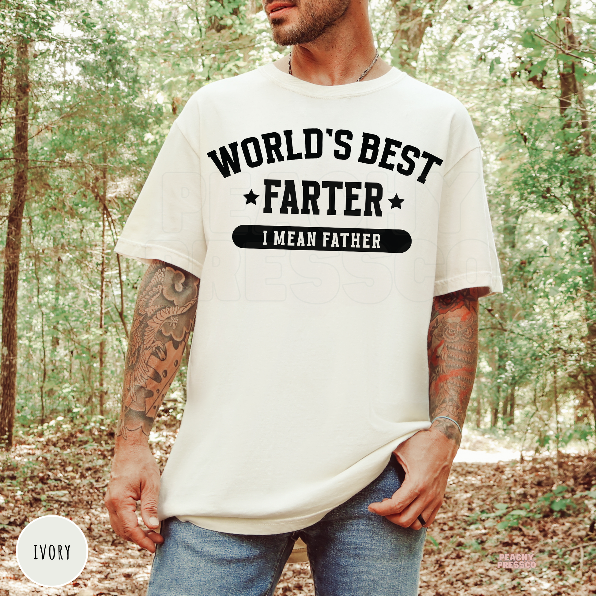 Ivory Comfort Colors t-shirt featuring the World's Best Farter I Mean Father graphic with bold black lettering, a humorous Father's Day gift.